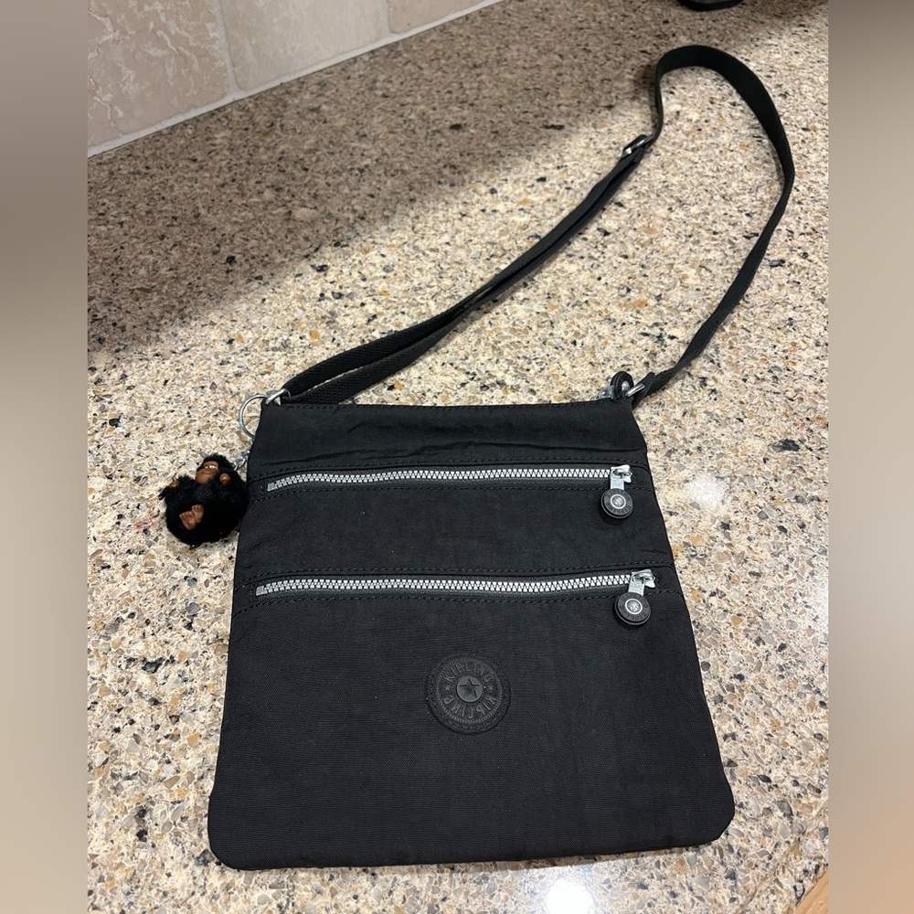 EUC. Kipling nylon cross body bag. Daniel.